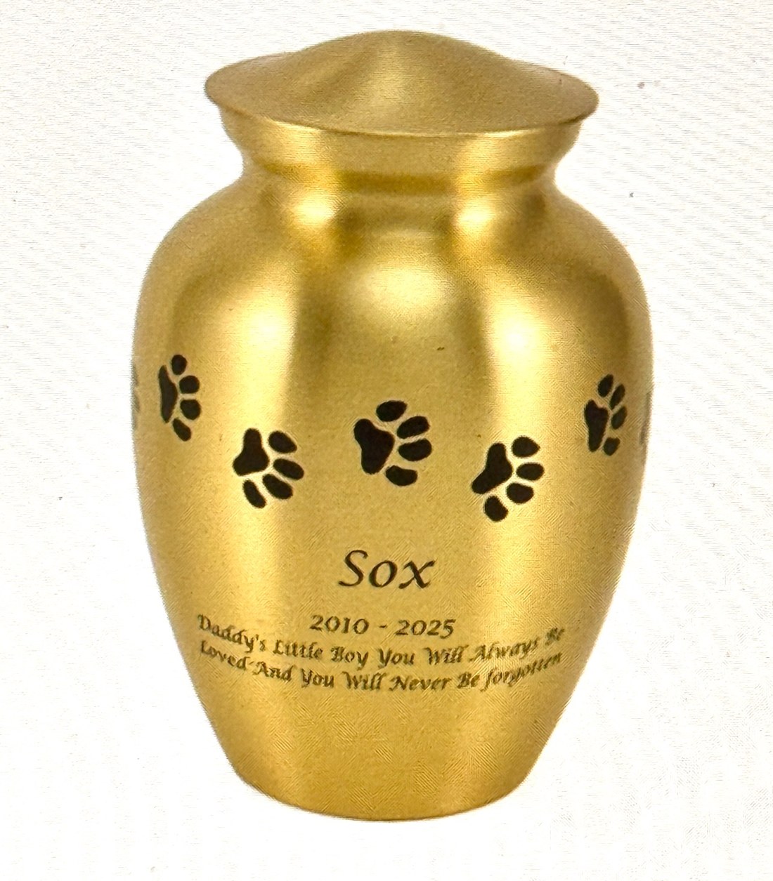 Gold paw print urn with Sox engraving